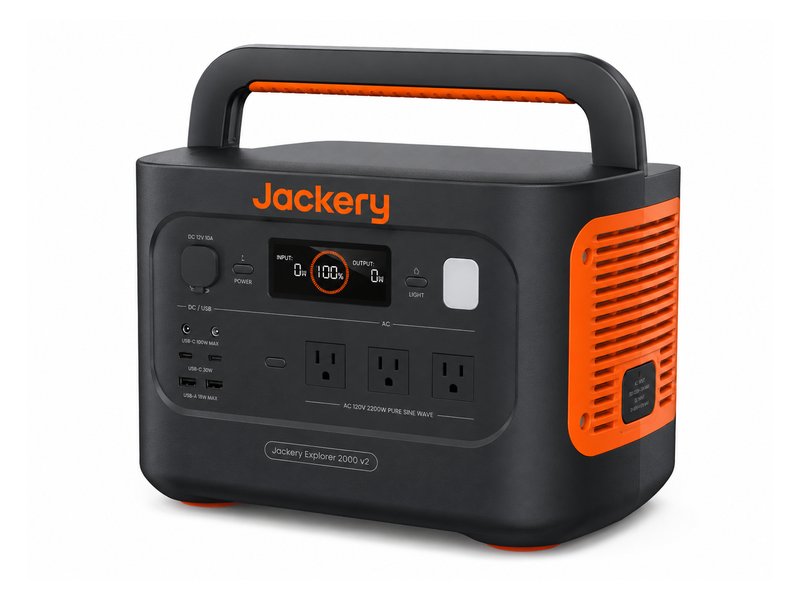 Jackery Explorer 2000 v2 portable power station — black body with orange accents and carry handle